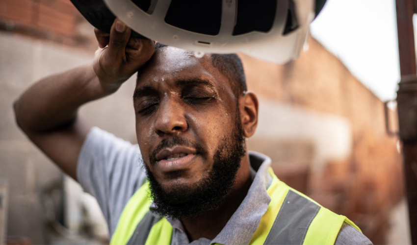 heat safety - worker cooling off from the heat heat safety - worker cooling off from the heat